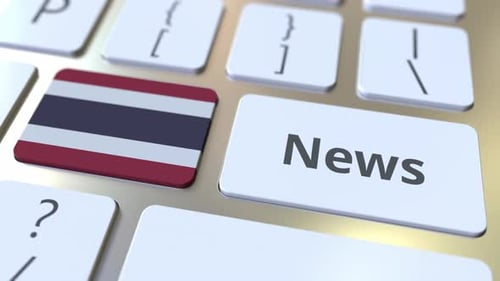 News Text and Flag of Thailand on the Keys of a Keyboard