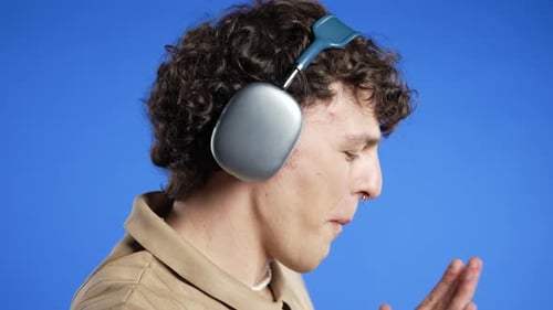 Young Adult Listening to Music with Headphones