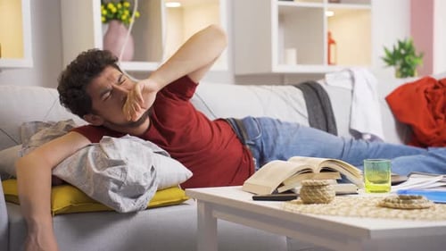 Lazy man yawning.