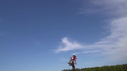 Motorcycle Jumps and Stunts in Rural Area