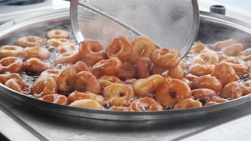 Traditional Fried Sweets Lokma in Sugar Syrup