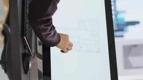 Vertical Video Technician Operating on Cad Software to Create Blueprint