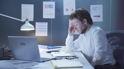 Businessman who is depressed and unhappy.