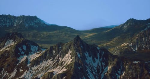 Mountains Rise Majestically Under a Clear Sky in a Remote Landscape