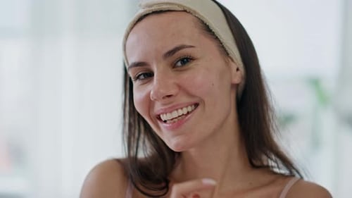 Smiling Woman Posing with Headband Indoors