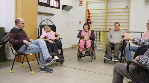 Adults with Disabilities in Therapy Session at Hospital