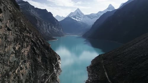 Natural Lake, Laguna Paron Peru Andean Cordillera Aerial Drone Above Clean Water with Mountain Peak