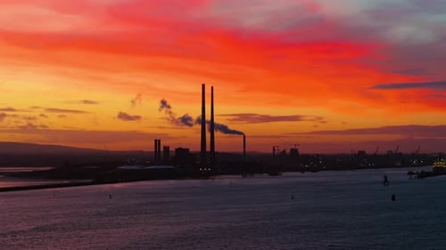 cinematic drone footage of Dublin, Ireland during an unforgettable sunset, showcasing dramatic