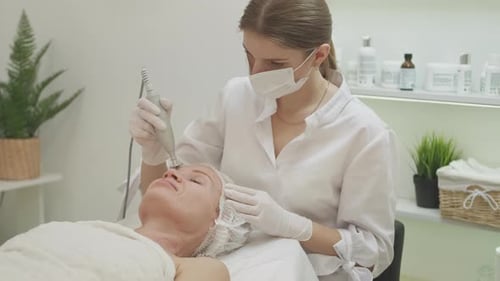 Woman Receiving a Facial at Medical Spa