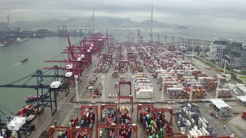 container cargo ship in export and import business and logistics international goods in urban city.