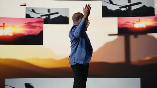 African American Guy Shows Gratitude Standing with Hands in Prayer Sign