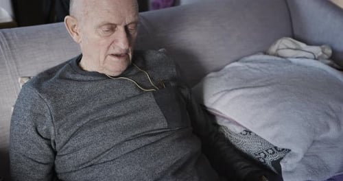 Man Resting at Home on the Couch