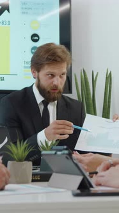 Close Up of Likable Purposeful Hardworking Mixed Race Business Colleagues Which Discussing Financial