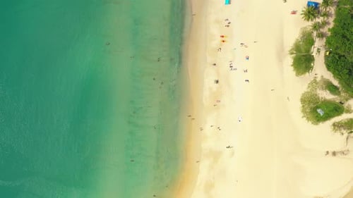 Aerial flying drone view of Kot Noi Beach white sandy beach on sunny tropical paradise island with a