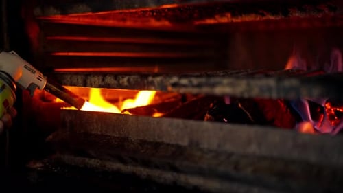 Closeup in a Professional Kitchen in a Grill Oven Hot Coals High Temperature