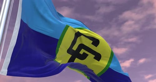 Waving Flag Animation with Custom Symbol Against a Cloudy Sky