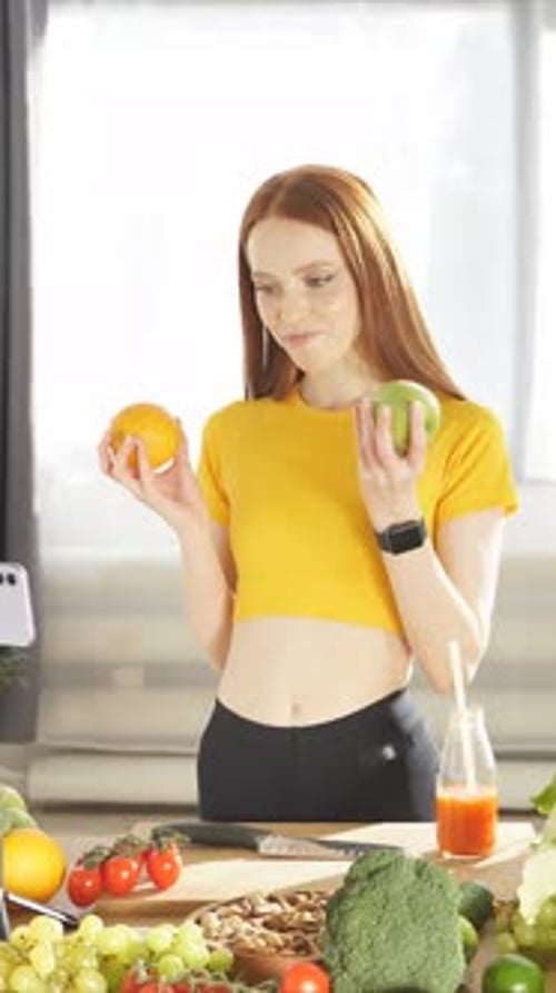Woman Displays Healthy Food for Online Broadcast