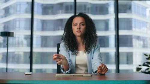 Futuristic Businesswoman Using Transparent Display Office