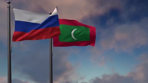 Russian and Maldivian Flags Waving Together against Blue Sky