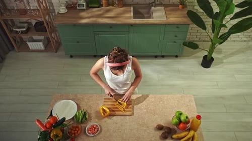 Young Woman at the Table in the Kitchen Preparing Spring Rolls for Healthy Lunch Top View Woman