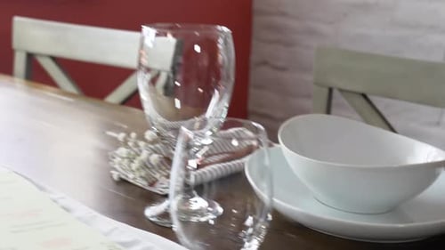 Restaurant Table Set with Beautiful Flowers and Lit Candels for Dinner Time Next to Sunny Window, Gi