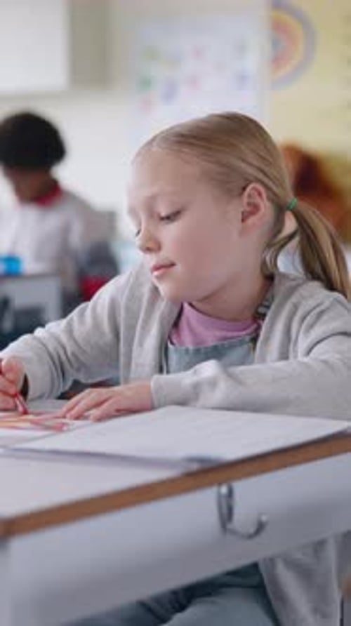 Girl, color and art at school with crayon, education or test for creativity with progress