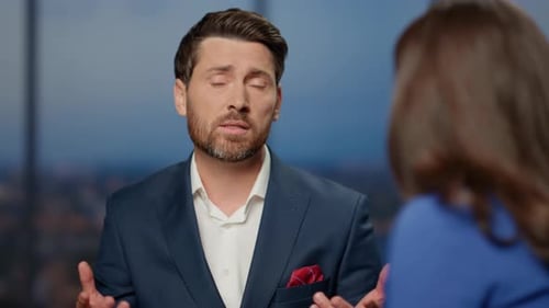 Upset Tv Show Man Expert Speaking with Anchorwoman on Air Closeup Program Guest