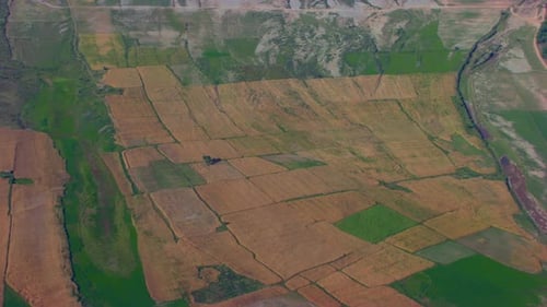 Aerial view over the farms land, Major of the yellow farms some are green