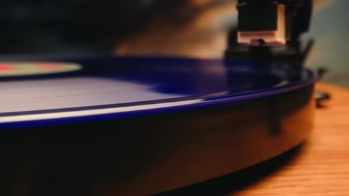 Blue Vinyl Record Spinning on a Turntable