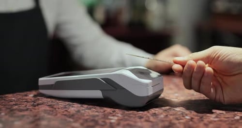 Closeup of Man Using Credit Card Contactless Payment Wireless Modern Technologies and Restaurant