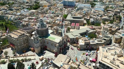 Aerial drone view of the walled city of Valletta, Malta, surrounded by the Mediterranean sea in dayl