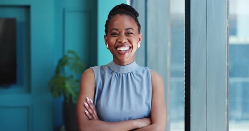 Face, woman and laughing with arms crossed in office for recruitment, job opportunity and integrity