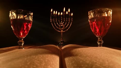 Hanukkah Celebration with Menorah, Wine, and Book