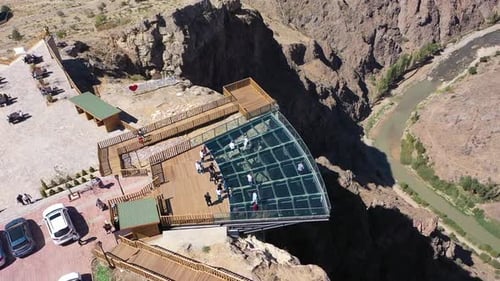 Aerial View Of People Enjoying The View On The Glass Terrace On The Hill
