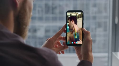 Man Video Calling Friend with Cocktail in Pool