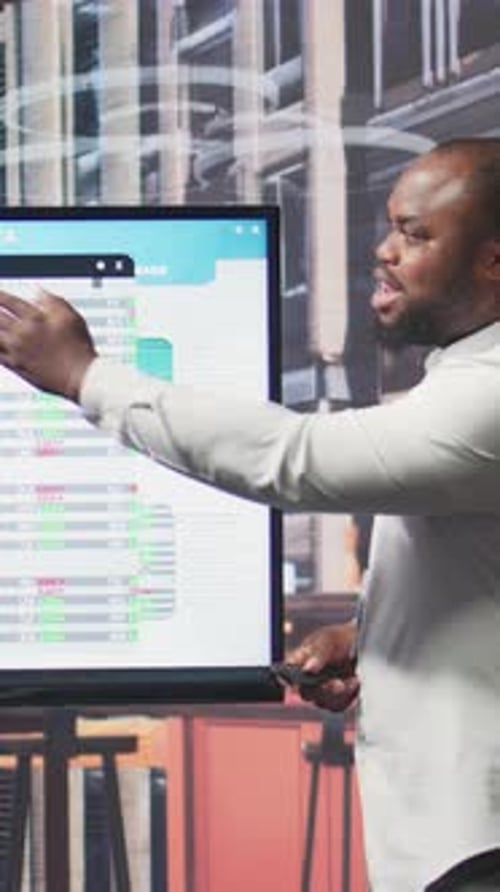 Vertical Video Financial Advisor Expert Highlighting Important Terms on Retirement Plan