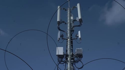 A Telecommunication Tower Stands Tall Against a Clear Blue Sky Showcasing Modern Technology