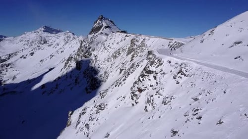 Aerial view of People Skiing and snowboarding on hill, Ski Resort.