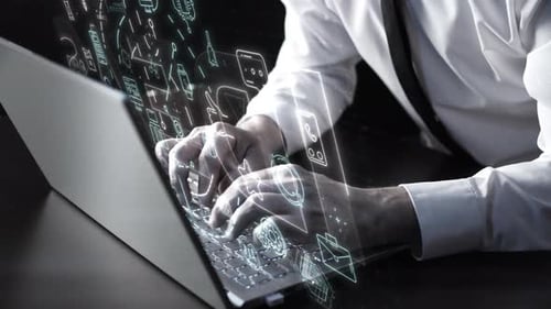 Businessman Working on Laptop with Digital Communication Icons Overlay
