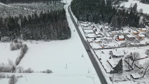 Serene Winter Landscape A Soft Focus Aerial View Capturing the Beauty of Snowy Fields and Lush