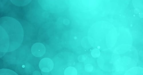 Enchanted Movement Of Cyan Particles Against A Dark Background