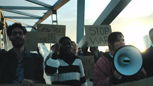 Diverse Group Protests Against War on a Bridge