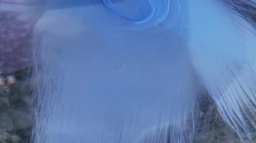 Ethereal Blue Ink Swirling in Water