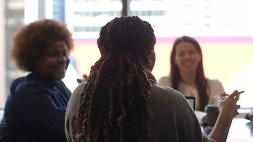Smiling Businesswomen Talking Planning in Office Meeting 2529 Years