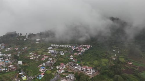 Drone view showcasing the peaceful mountain lifestyle of Kodaikanal