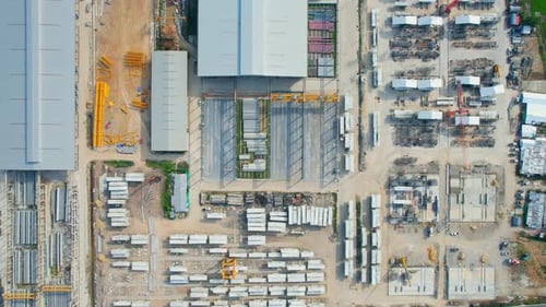 4K : Drones are flying over a many concrete material