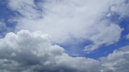 Time-lapse of Majestic Clouds Moving Across Blue Sky