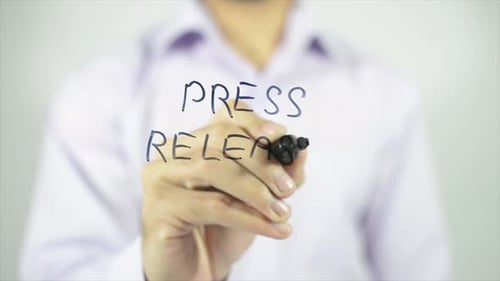 Writing Press Release on Glass Surface