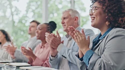 Diverse Team Clapping at a Corporate Conference