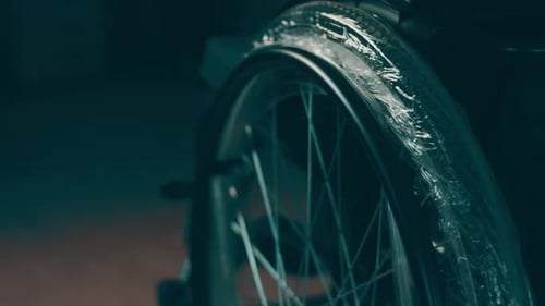 A Disabled Man Assembles a Stroller